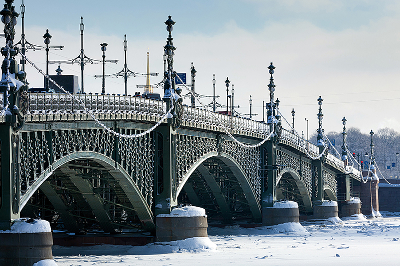 Ice-covered Trinity Bridge in winter in Saint-Petersburg, Russia