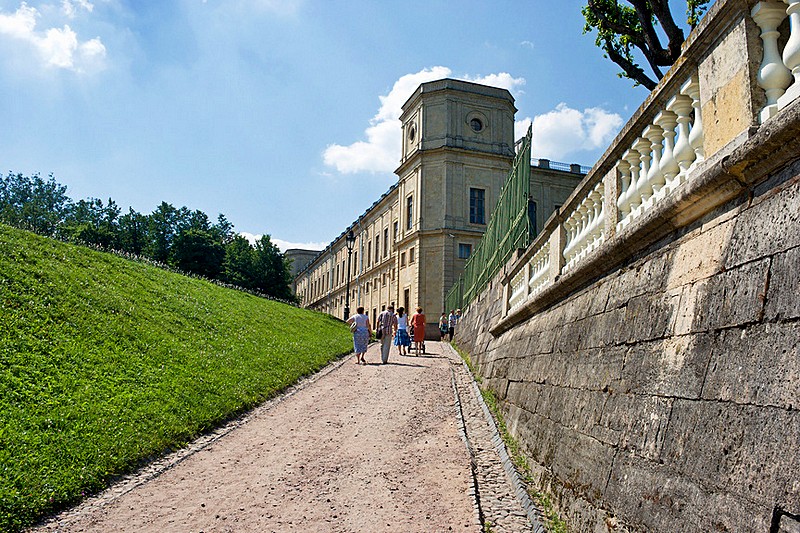 Visitors walking towards the Private Garden of the palace in Gatchina, royal estate south of St Petersburg, Russia