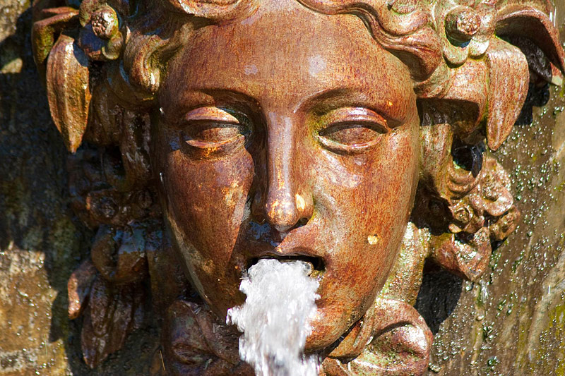 Masque - detail of a fountain in Peterhof near St Petersburg, Russia