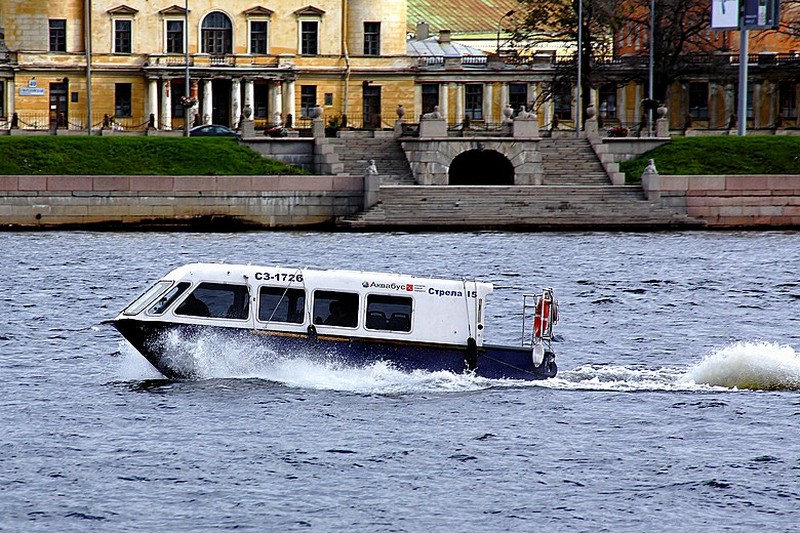 Aquabus in front of the Kushelev-Bezborodko Mansion on Sverdlovskaya Embankment in Saint-Petersburg, Russia