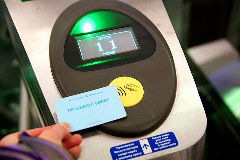 Using a magnetic card to enter the metro, instead of the more traditional tokens in St Petersburg, Russia